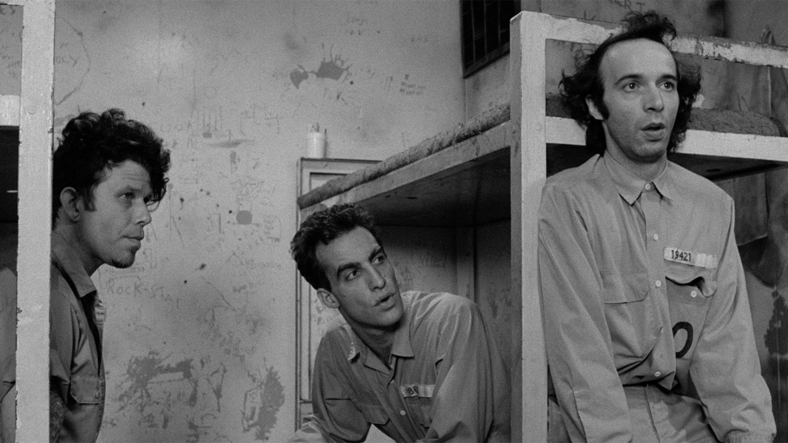 Scene from Down by Law — three men escaping through the Louisiana bayou in a canoe